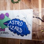 Astro Lizard at Midnight Mass Rudes by Grace Suzette Dunn