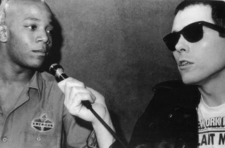 Glenn O'Brien w/ Basquiat. Photo by Bobby Grossman